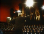 Mr. Krueger conducts the Mormon Tabernacle Choir singing Christmas songs in his dream.
